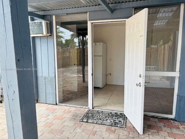 4710 NW 3rd Ter, Deerfield Beach, FL 33064 - property entrance with a wall unit AC