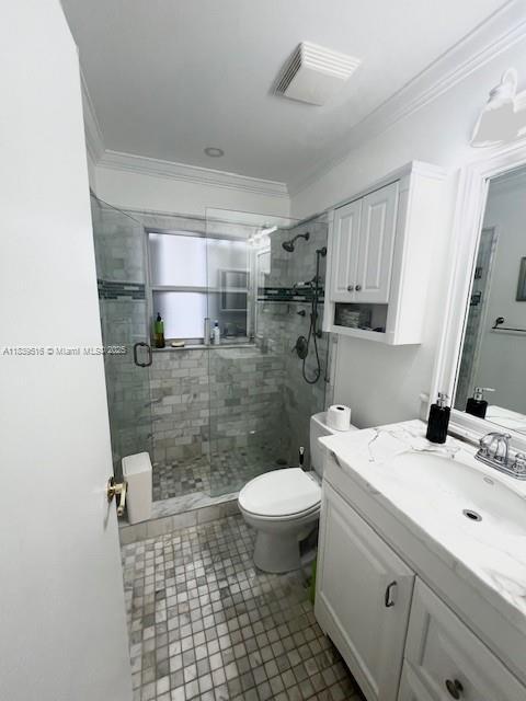4966 SW 33rd Ter, Hollywood, FL 33312 - full bathroom with vanity, crown molding, a stall shower, and tile patterned flooring