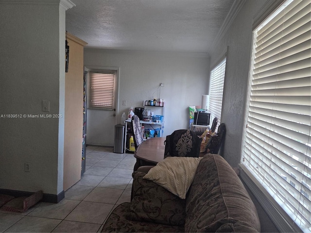 2936 NW 47th St, Miami, FL 33142 - living area with ornamental molding, light tile patterned flooring, and a textured ceiling