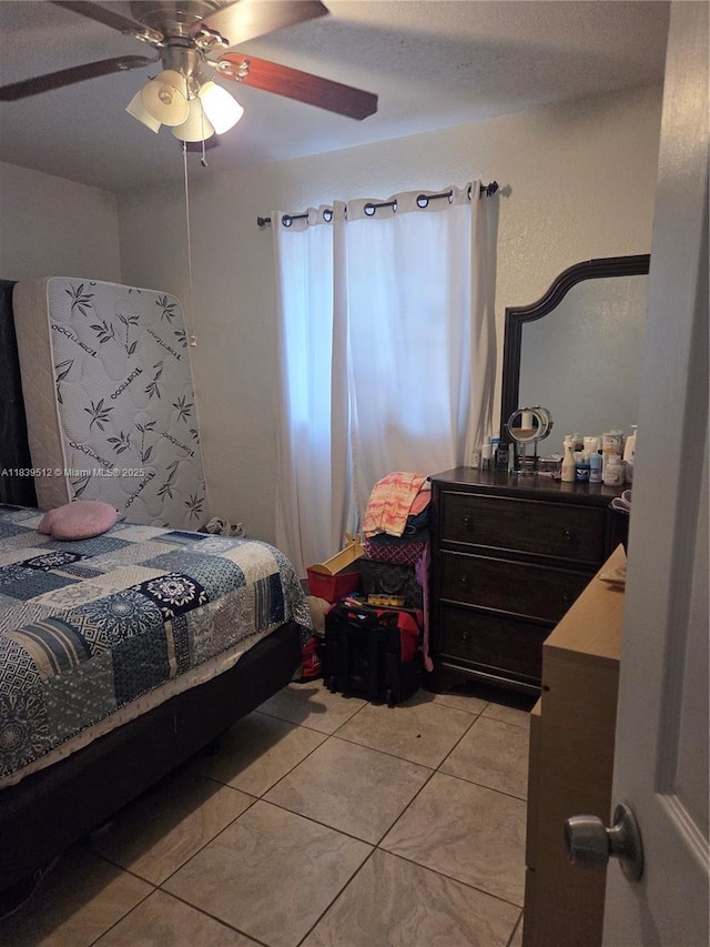 2936 NW 47th St, Miami, FL 33142 - bedroom with light tile patterned floors and ceiling fan