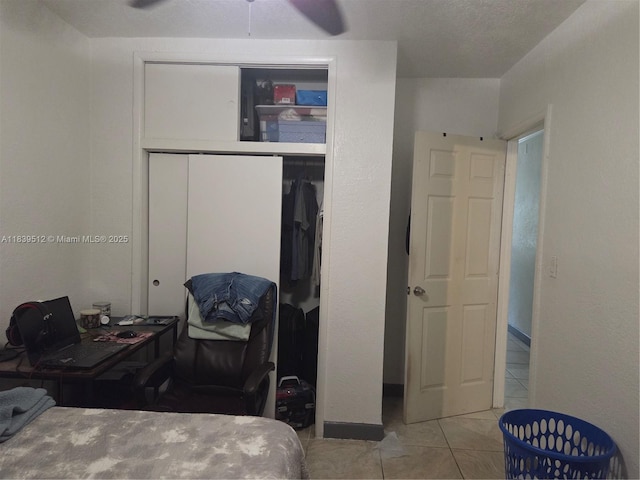 2936 NW 47th St, Miami, FL 33142 - bedroom with a closet, an office area, and tile patterned flooring