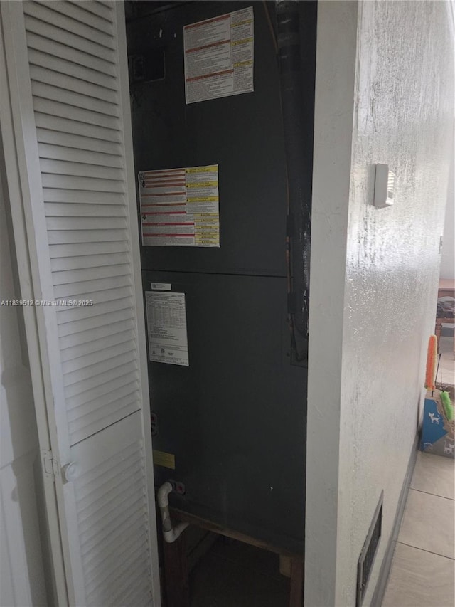 2936 NW 47th St, Miami, FL 33142 - utility room featuring heating unit