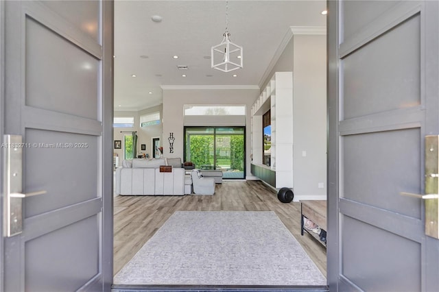17809 Southwick Way, Boca Raton, FL 33498 - entrance foyer featuring crown molding, light wood-style flooring, and recessed lighting