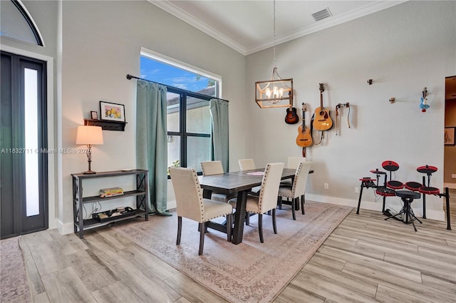 17809 Southwick Way, Boca Raton, FL 33498 - dining area with crown molding, a chandelier, and wood finished floors