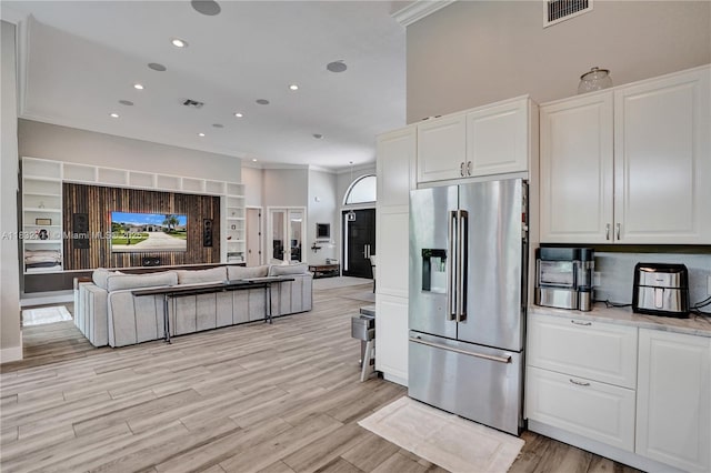 17809 Southwick Way, Boca Raton, FL 33498 - kitchen featuring high quality fridge, open floor plan, ornamental molding, white cabinetry, and recessed lighting