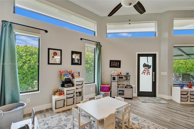 17809 Southwick Way, Boca Raton, FL 33498 - foyer with ceiling fan, crown molding, light wood-type flooring, and a high ceiling