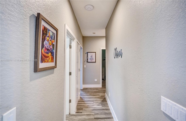 17809 Southwick Way, Boca Raton, FL 33498 - hallway with a textured wall and wood finished floors