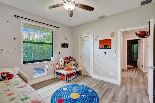 17809 Southwick Way, Boca Raton, FL 33498 - bedroom with light wood-style floors and ceiling fan