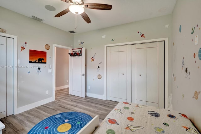 17809 Southwick Way, Boca Raton, FL 33498 - bedroom with light wood finished floors, a closet, and a ceiling fan