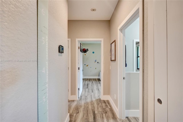 17809 Southwick Way, Boca Raton, FL 33498 - hall featuring light wood-style flooring and baseboards