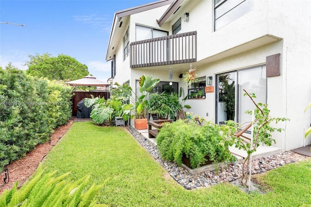 640 NW 98th Ct Unit 640, Miami, FL 33172 - view of yard with a balcony and a gazebo