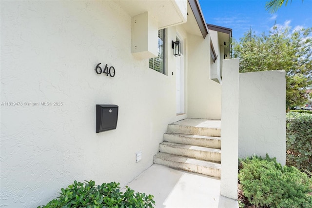 640 NW 98th Ct Unit 640, Miami, FL 33172 - doorway to property featuring stucco siding