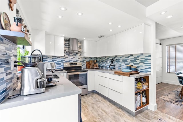 640 NW 98th Ct Unit 640, Miami, FL 33172 - kitchen featuring stainless steel electric range, modern cabinets, wall chimney range hood, open shelves, and recessed lighting