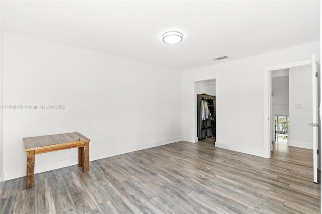 640 NW 98th Ct Unit 640, Miami, FL 33172 - spare room featuring wood finished floors and baseboards