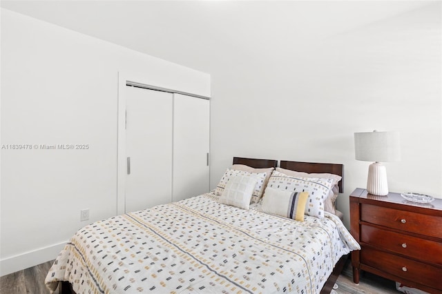 640 NW 98th Ct Unit 640, Miami, FL 33172 - bedroom featuring wood finished floors and a closet