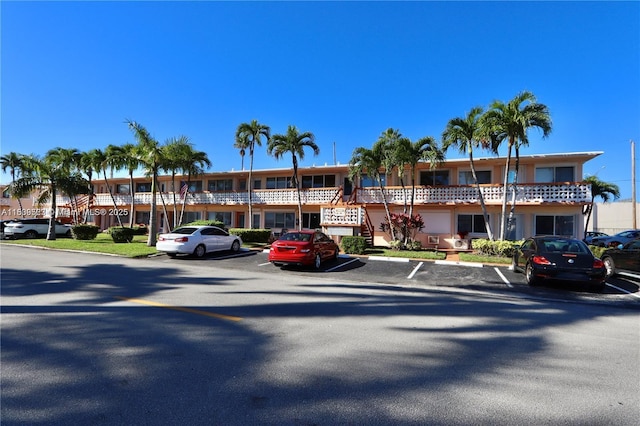 900 SW 11th Ave Unit C, Hallandale Beach, FL 33009 - view of building exterior featuring uncovered parking