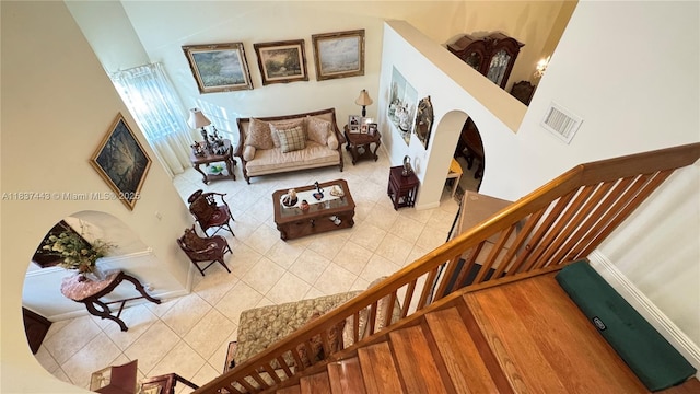 15588 SW 62nd St, Miami, FL 33193 - tiled living room with stairs and arched walkways