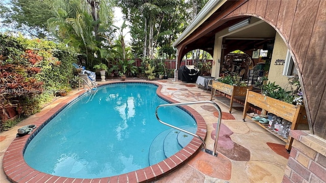 15588 SW 62nd St, Miami, FL 33193 - view of pool with a fenced backyard, a patio, and grilling area