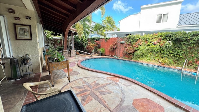 15588 SW 62nd St, Miami, FL 33193 - view of swimming pool with a fenced backyard and a patio