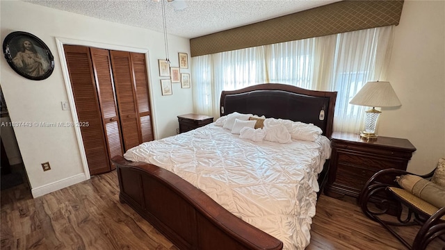 15588 SW 62nd St, Miami, FL 33193 - bedroom featuring wood finished floors, a closet, and a textured ceiling