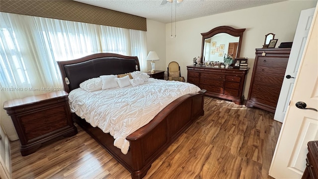 15588 SW 62nd St, Miami, FL 33193 - bedroom featuring wood finished floors and a textured ceiling