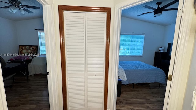 15588 SW 62nd St, Miami, FL 33193 - hall with vaulted ceiling, wood finished floors, and a textured ceiling