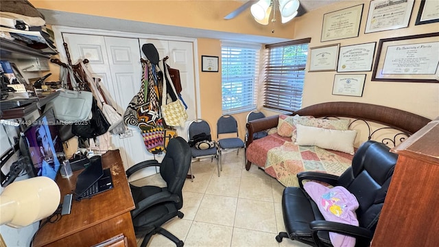 15588 SW 62nd St, Miami, FL 33193 - bedroom with light tile patterned floors, a closet, ceiling fan, radiator, and an office area
