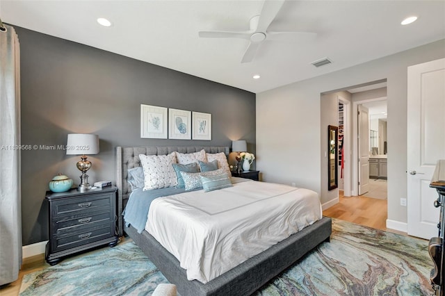 15734 SW Egret Coast Dr, Port St Lucie, FL 34987 - bedroom with light wood-type flooring, recessed lighting, and ceiling fan
