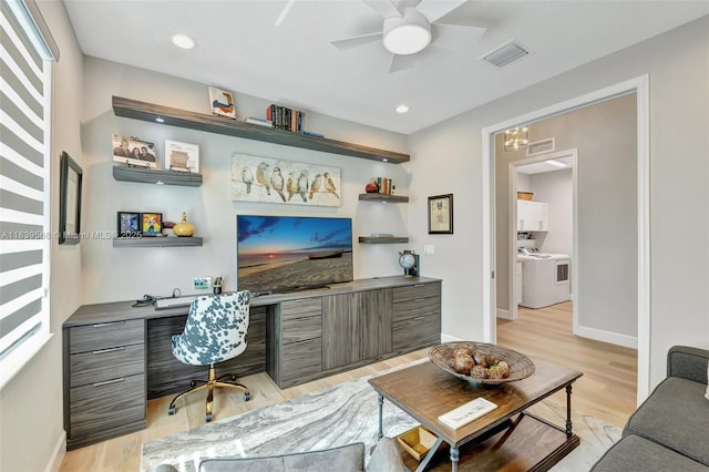 15734 SW Egret Coast Dr, Port St Lucie, FL 34987 - office with built in desk, separate washer and dryer, light wood-style floors, a ceiling fan, and recessed lighting