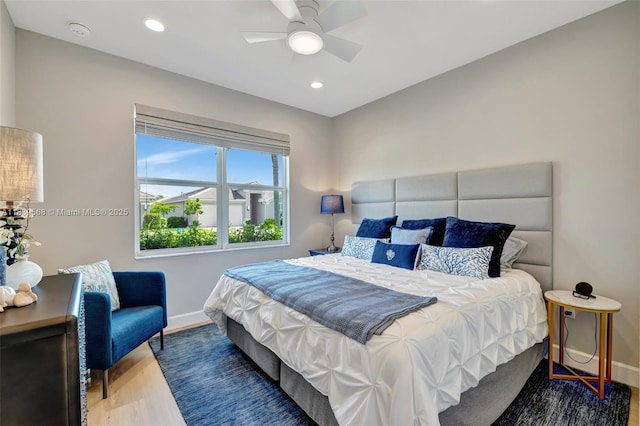 15734 SW Egret Coast Dr, Port St Lucie, FL 34987 - bedroom featuring wood finished floors, recessed lighting, and a ceiling fan