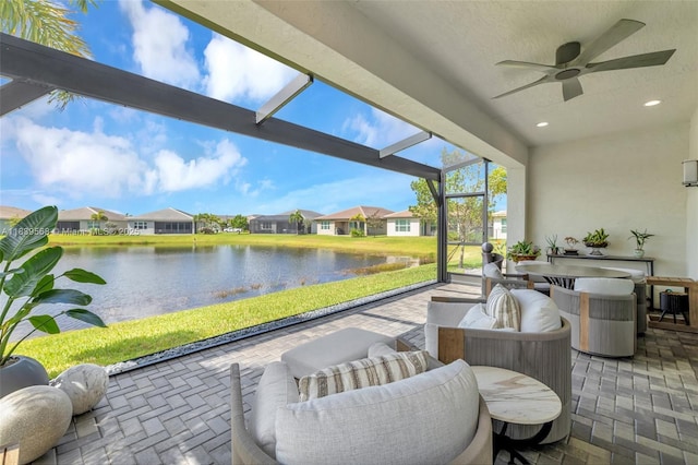 15734 SW Egret Coast Dr, Port St Lucie, FL 34987 - sunroom with ceiling fan, a water view, and a residential view