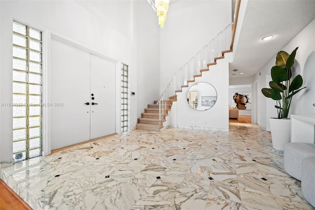 7545 Banyan Way, Tamarac, FL 33321 - entrance foyer with stairway, healthy amount of natural light, and marble tiled flooring
