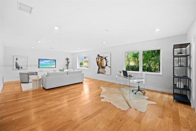 7545 Banyan Way, Tamarac, FL 33321 - living area featuring light wood-style flooring and recessed lighting