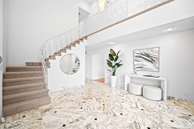 7545 Banyan Way, Tamarac, FL 33321 - foyer entrance with a towering ceiling, stairway, recessed lighting, and marble finish floors