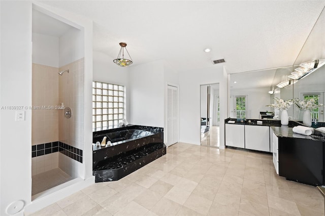 7545 Banyan Way, Tamarac, FL 33321 - full bath with a tile shower, a bath, and vanity