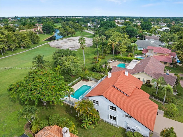 7545 Banyan Way, Tamarac, FL 33321 - bird's eye view of a pool and a tree filled landscape