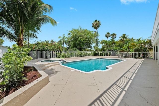 7545 Banyan Way, Tamarac, FL 33321 - view of pool with a patio and a pool with connected hot tub