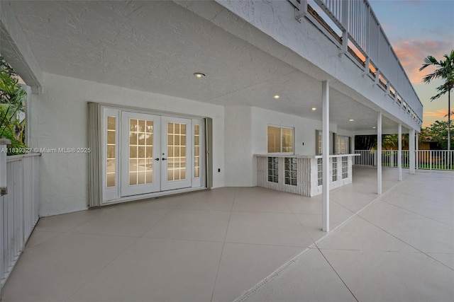 7545 Banyan Way, Tamarac, FL 33321 - view of patio / terrace featuring french doors