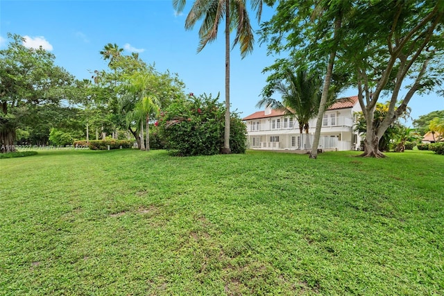 7545 Banyan Way, Tamarac, FL 33321 - view of green lawn featuring a balcony