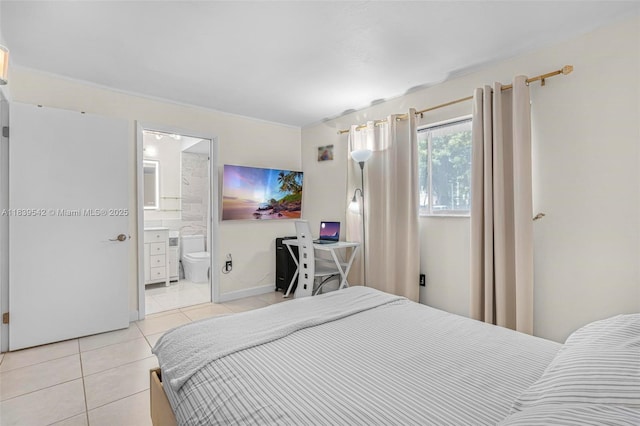 8415 SW 107th Ave Unit 130W, Miami, FL 33173 - bedroom with light tile patterned flooring and connected bathroom