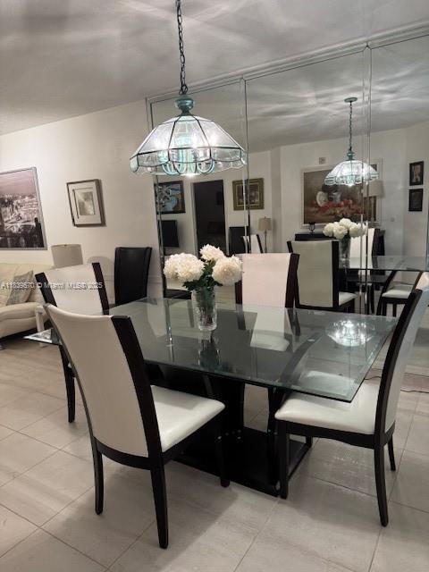 901 SW 141st Ave Unit 405M, Pembroke Pines, FL 33027 - dining room featuring light tile patterned floors