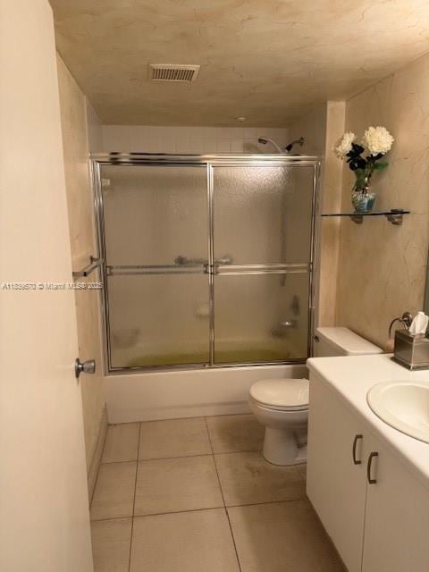 901 SW 141st Ave Unit 405M, Pembroke Pines, FL 33027 - bathroom with vanity, combined bath / shower with glass door, and tile patterned floors
