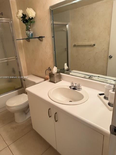 901 SW 141st Ave Unit 405M, Pembroke Pines, FL 33027 - full bath with vanity, tile patterned floors, and enclosed tub / shower combo