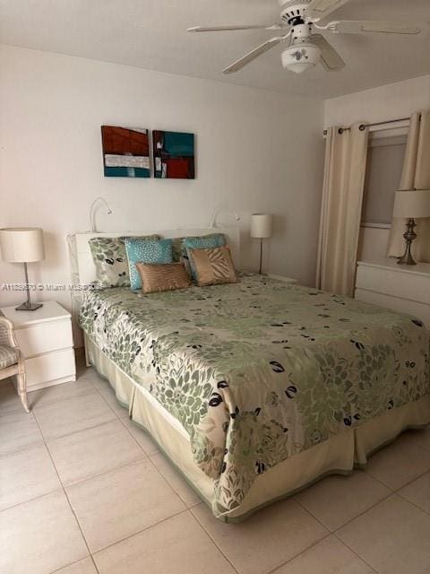 901 SW 141st Ave Unit 405M, Pembroke Pines, FL 33027 - bedroom featuring light tile patterned floors and ceiling fan