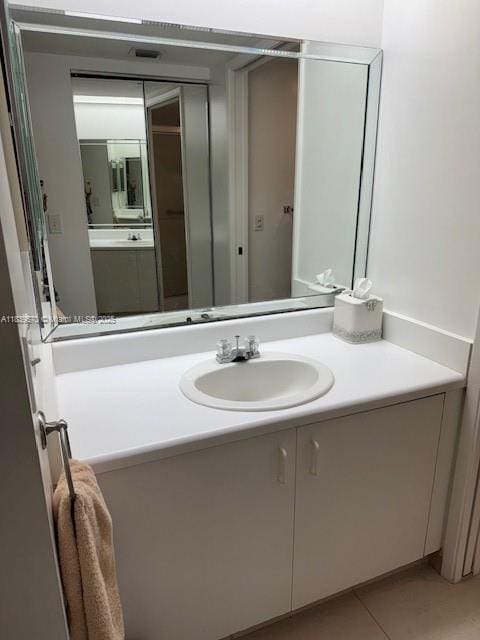 901 SW 141st Ave Unit 405M, Pembroke Pines, FL 33027 - bathroom with vanity and tile patterned flooring
