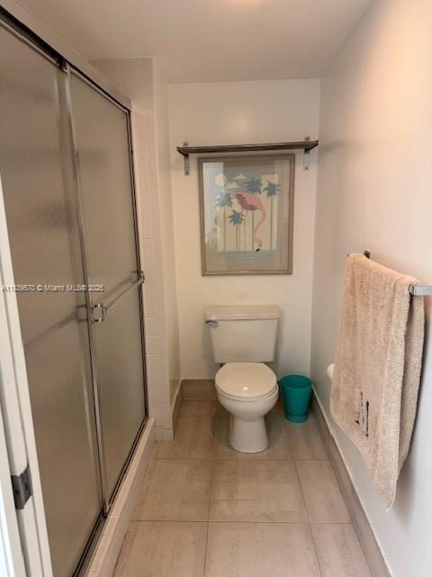 901 SW 141st Ave Unit 405M, Pembroke Pines, FL 33027 - full bath featuring an enclosed shower and tile patterned flooring