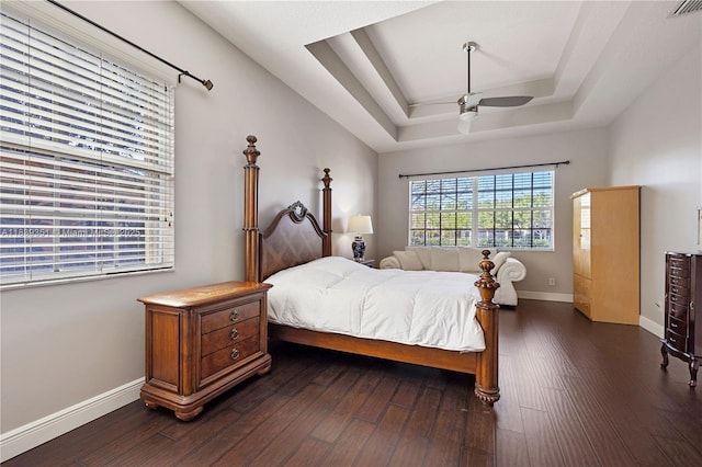 109 SW 128th Ave, Plantation, FL 33325 - bedroom with a tray ceiling, dark wood finished floors, and ceiling fan