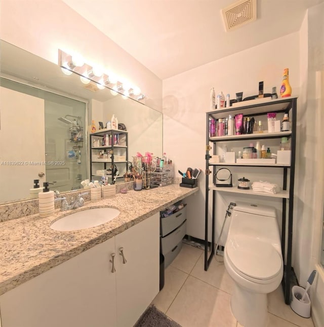 16652 Hemingway Dr, Weston, FL 33326 - full bath featuring tile patterned flooring, vanity, and a shower
