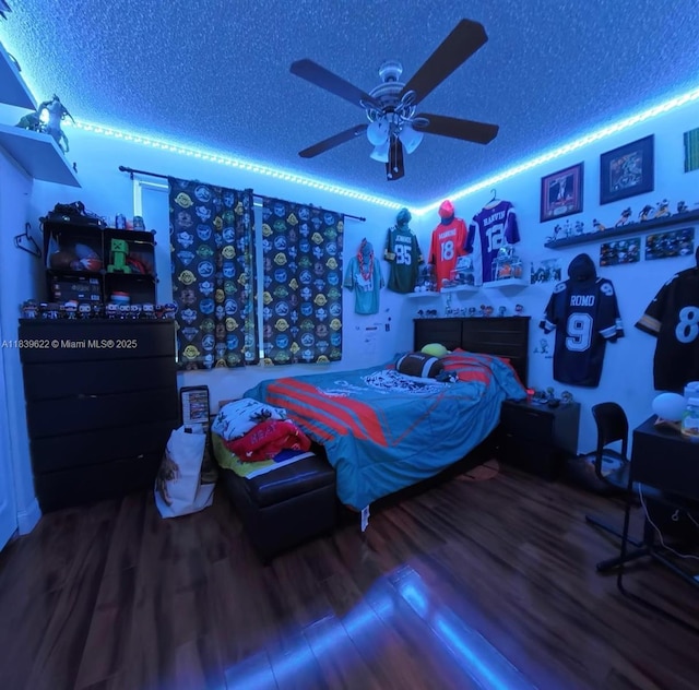 16652 Hemingway Dr, Weston, FL 33326 - bedroom with wood finished floors, a textured ceiling, and ceiling fan
