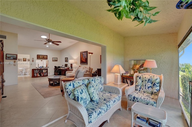 8406 NW 78th Ct, Tamarac, FL 33321 - living area with a textured wall, tile patterned flooring, a ceiling fan, a textured ceiling, and recessed lighting
